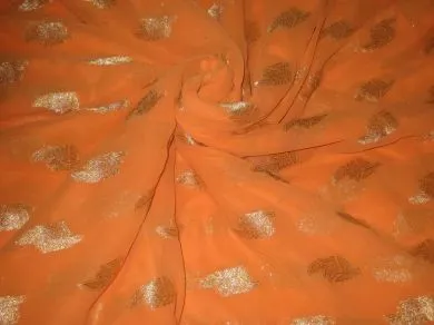 Polyester georgette fabric with metalic silver & gold jacquard~Sunny Orange colour